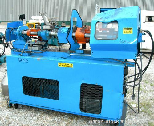 USED: Pilot Industries 16 ton hydraulic injection molding machine, model PTD-016-PCM. Approx mold size 6" x 8". (2) 2-1/2" diameter tie bars, approx 1" diameter screw. Used 7457 hours.