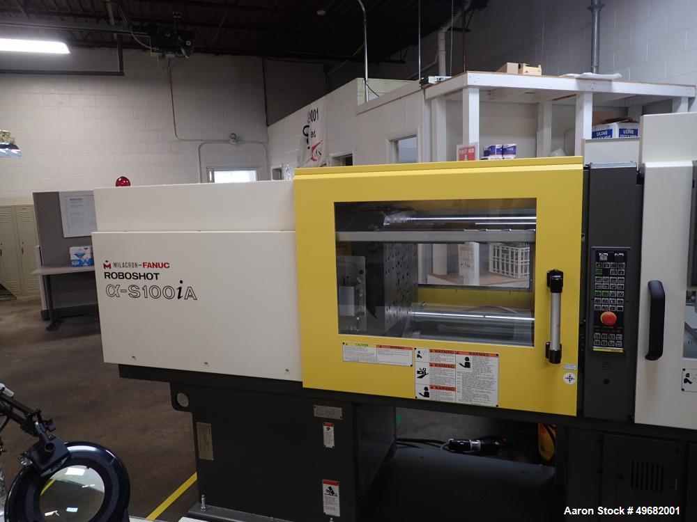 Used Milacron Roboshot 110 Ton Injection Molding Machine, Model S100i. Includes Moldmasters temp control Temp Master M2, Model #M2XS-12-MTS. Milacron Thermolator Model # MFCH7-75P. Dryer/hopper loadi...