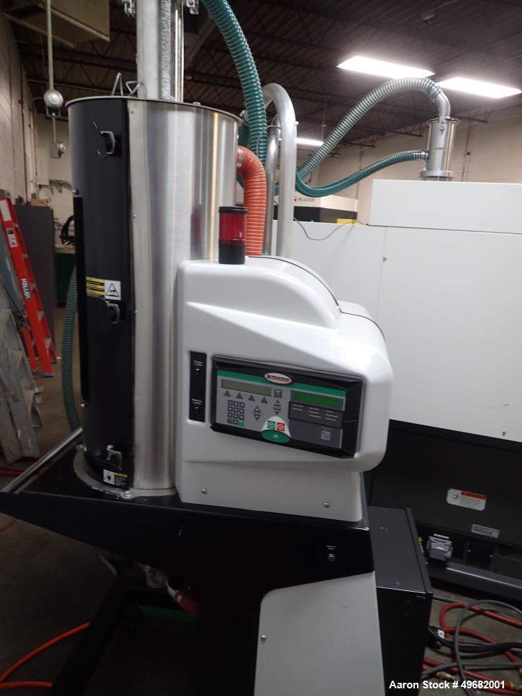 Used Milacron Roboshot 110 Ton Injection Molding Machine, Model S100i. Includes Moldmasters temp control Temp Master M2, Model #M2XS-12-MTS. Milacron Thermolator Model # MFCH7-75P. Dryer/hopper loadi...