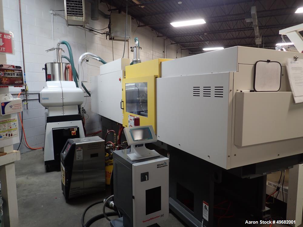 Used Milacron Roboshot 110 Ton Injection Molding Machine, Model S100i. Includes Moldmasters temp control Temp Master M2, Model #M2XS-12-MTS. Milacron Thermolator Model # MFCH7-75P. Dryer/hopper loadi...