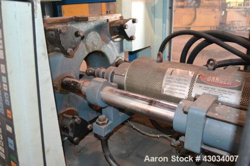 Used Sandretto Micro30 30 Ton Hydraulic Horizontal Injection Mold Machine, Model 300/107. Approximate 1-3/4" diameter tie bars, 12" x 12" distance between bars, 17-3/4" x 17-3/4" platen size. Operato...