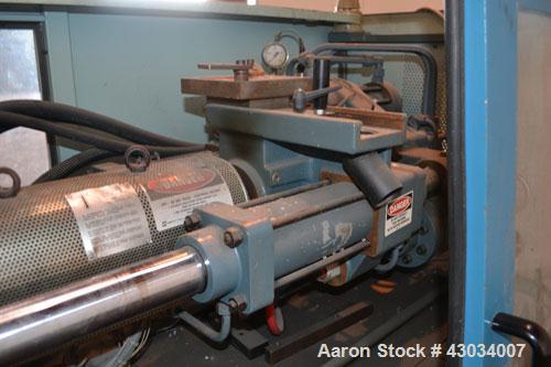 Used Sandretto Micro30 30 Ton Hydraulic Horizontal Injection Mold Machine, Model 300/107. Approximate 1-3/4" diameter tie bars, 12" x 12" distance between bars, 17-3/4" x 17-3/4" platen size. Operato...