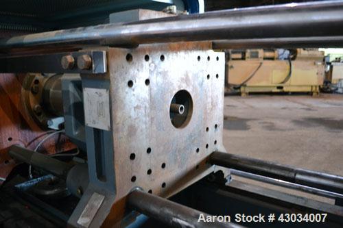 Used Sandretto Micro30 30 Ton Hydraulic Horizontal Injection Mold Machine, Model 300/107. Approximate 1-3/4" diameter tie bars, 12" x 12" distance between bars, 17-3/4" x 17-3/4" platen size. Operato...
