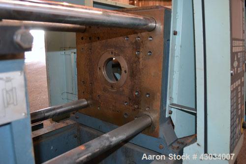 Used Sandretto Micro30 30 Ton Hydraulic Horizontal Injection Mold Machine, Model 300/107. Approximate 1-3/4" diameter tie bars, 12" x 12" distance between bars, 17-3/4" x 17-3/4" platen size. Operato...