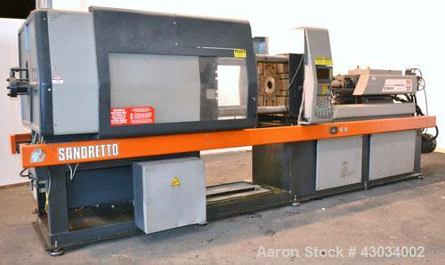 Used Sandretto Series Otto Advantage 175 Ton Toggle Horizontal Injection Mold Machine, Model 430/175. Approximate 3-3/4" diameter tie bars, 20-1/4" x 20-1/4" distance between bars, 30" x 30" platen s...
