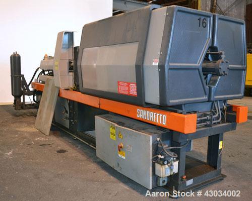 Used Sandretto Series Otto Advantage 175 Ton Toggle Horizontal Injection Mold Machine, Model 430/175. Approximate 3-3/4" diameter tie bars, 20-1/4" x 20-1/4" distance between bars, 30" x 30" platen s...