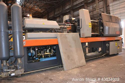 Used Sandretto Series Otto Advantage 175 Ton Toggle Horizontal Injection Mold Machine, Model 430/175. Approximate 3-3/4" diameter tie bars, 20-1/4" x 20-1/4" distance between bars, 30" x 30" platen s...