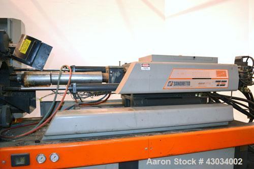 Used Sandretto Series Otto Advantage 175 Ton Toggle Horizontal Injection Mold Machine, Model 430/175. Approximate 3-3/4" diameter tie bars, 20-1/4" x 20-1/4" distance between bars, 30" x 30" platen s...