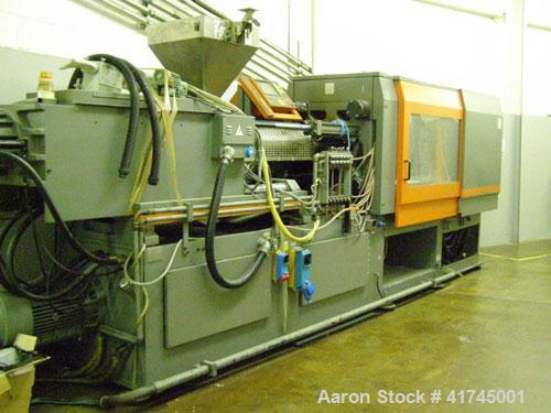 Used Sandretto Injection Molding Machine, Series Sette 350 T Series 7. Pressure on clamp 15 tons. Complete with a control panel.
