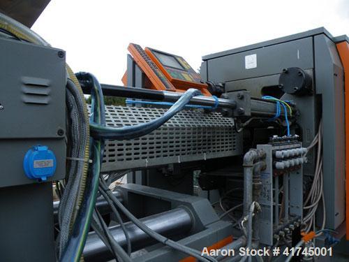 Used Sandretto Injection Molding Machine, Series Sette 350 T Series 7. Pressure on clamp 15 tons. Complete with a control panel.