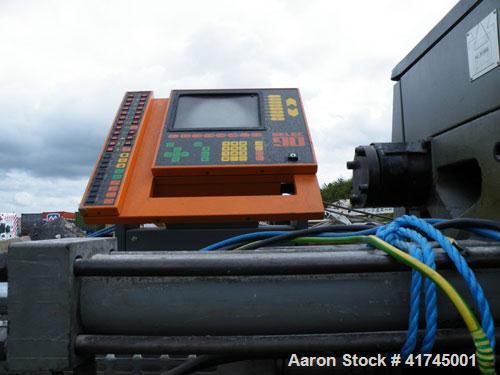 Used Sandretto Injection Molding Machine, Series Sette 350 T Series 7. Pressure on clamp 15 tons. Complete with a control panel.