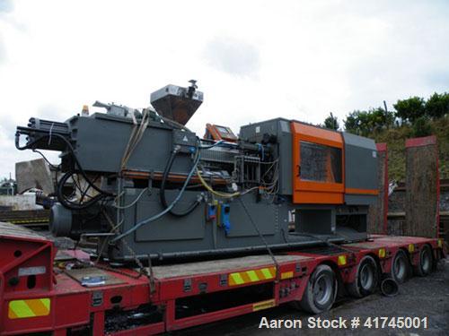 Used Sandretto Injection Molding Machine, Series Sette 350 T Series 7. Pressure on clamp 15 tons. Complete with a control panel.