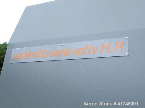 Used Sandretto Injection Molding Machine, Series Sette 350 T Series 7. Pressure on clamp 15 tons. Complete with a control panel.