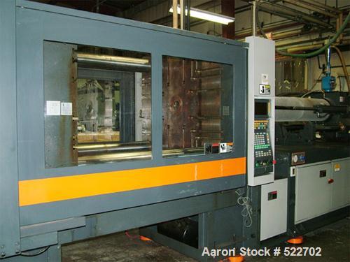 USED: Sandretto 610 ton, 138 oz, model TEW-610 plastic molding machine2001. Platen size 53" x 48"; distance between tie bars 37" x 33",min/max mold 12"/39", ejection stroke 13.8", dimensions 39.4" x ...