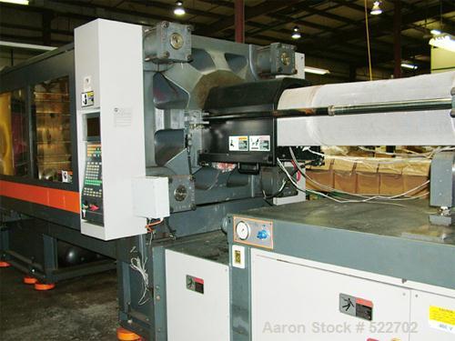 USED: Sandretto 610 ton, 138 oz, model TEW-610 plastic molding machine2001. Platen size 53" x 48"; distance between tie bars 37" x 33",min/max mold 12"/39", ejection stroke 13.8", dimensions 39.4" x ...