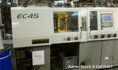 Used Toshiba Electric Injection Molding Machine, Model EC45-1A.  45 tons, shot size 1.59 oz, electric clamp, tie bar dist (H x V) 12.6" x 12.6".  Platen size (H x V) 18" x 18". Daylight min 5.9", max...