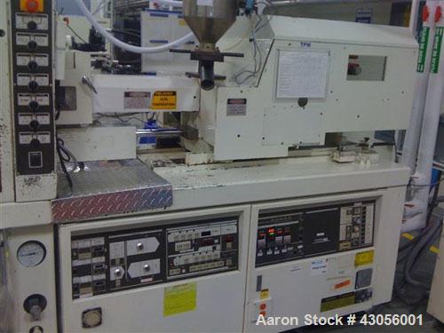 Used Toshiba Injection Molding Machine, 85 ton, model ISP85N11.  Barrel size 1.7 oz / 32 mm.  Tie bar clearance 14 1/4.  Max daylight 24.9.  Min closed 6.69.  3 phase, 60 hz, 460 volt, 50 amp. Manufa...