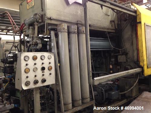 Used Uniloy 400 ton structural foam injection molding machine. 879 oz shot size HDPE foam, platen measures 67" x 58", daylight 120", stroke 108", min mold height 12", Maco 8000 controls, Allen Bradle...