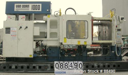 USED: Van Dorn 1000 ton hydraulic injection molding machine, model 1000H-RS-165FXLP. Platen size approximately 65" x 65". Distance between 8" diameter tie bars approximately 52" left to right x 44" t...
