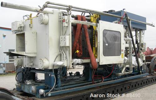USED: Van Dorn 1000 ton hydraulic injection molding machine, model 1000H-RS-165FXLP. Platen size approximately 65" x 65". Distance between 8" diameter tie bars approximately 52" left to right x 44" t...
