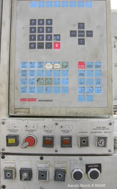 USED: Van Dorn 1000 ton hydraulic injection molding machine, model 1000H-RS-165FXLP. Platen size approximately 65" x 65". Distance between 8" diameter tie bars approximately 52" left to right x 44" t...