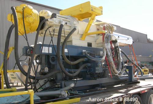 USED: Van Dorn 1000 ton hydraulic injection molding machine, model 1000H-RS-165FXLP. Platen size approximately 65" x 65". Distance between 8" diameter tie bars approximately 52" left to right x 44" t...