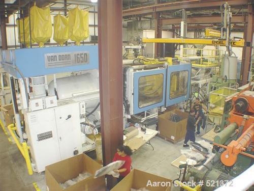 USED: Van Dorn injection molding machine, model 1650-260. 1650 ton,260 oz shot capacity. Unit platen size is 65" x 65". Pathfinder 5000controls. Options include core pull, moving platen supports, inc...