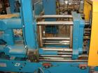 Used Boy horizontal injection molder, 25 ton, model 25M. With Proscan control LCD screen. Includes hopper. Built 1995.