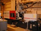 Used Cincinnati 220 ton, 8 oz Powerline, model NT220. Type: electric. New 2005. *Brand new 13 oz screw and barrel in a box!* Platen size 32.80