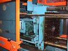 USED: Demag 60 ton injection molding machine, model D60-151. Distance between tie bars 12-1/2