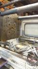 Used Husky Horizontal Injection Mold Machine, 300 Tons, Model SX300 RS60/50. Platen Size: 40.79
