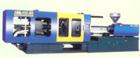USED: Hwanda plastic injection molding machine, model HMD88-M6. 880 kn, 99 ton, 121 gram shot weight, 320 mm opening stroke, 4.42 meters long x 1.07 meters wide x 1.72 meters high.