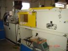 USED: Mitsubishi model 90MJ2-5, 90 ton injection molding machine. Mfg 2000. 4.9 oz shot. Tie bar spacing is 14.96