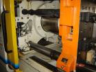 USED: Mitsubishi model 90MJ2-5, 90 ton injection molding machine. Mfg 2000. 4.9 oz shot. Tie bar spacing is 14.96