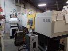Used Milacron Roboshot 110 Ton Injection Molding Machine, Model S100i. Includes Moldmasters temp control Temp Master M2, Model #M2XS-12-MTS. Milacron Thermolator Model # MFCH7-75P. Dryer/hopper loadi...