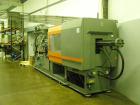 Used Sandretto Injection Molding Machine, Series Sette 350 T Series 7. Pressure on clamp 15 tons. Complete with a control panel.