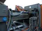 Used Sandretto Injection Molding Machine, Series Sette 350 T Series 7. Pressure on clamp 15 tons. Complete with a control panel.