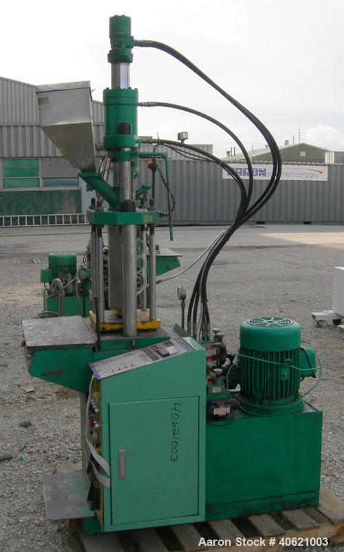 Used Ta So Machinery Vertical Injection Molder. (2) 2 1/2" diameter tie bars. Top platen 10 3/4" x 10 3/4". Driven by a 5 hp, 3/60/220/380 volt, 1160 rpm hydraulic power pack.