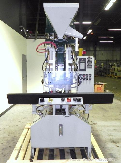 Used Autojectors Model VS10-S Vertical Injection Molding Machine. 10 Ton system. Approximate shot size 1.74 oz. Has vertical hydraulic clamp, 1" vertical screw injection, approximate 15 to 1 L/D rati...