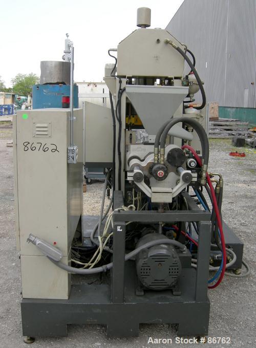 Used Cincinnati Milacron 70 Ton Vertical Rotary Insert Injection Molding Machine, Model Vector CH-70-R. Platen size approximately 10" x 16". 48" diameter, 4 station rotating table. Max daylight 19", ...