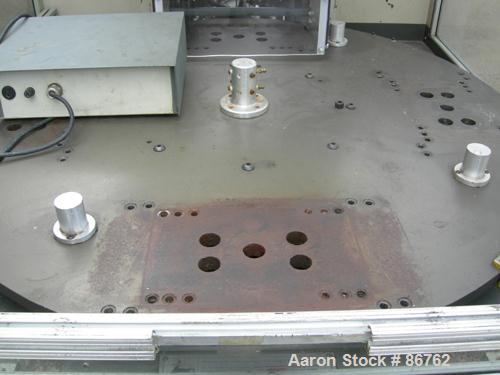 Used Cincinnati Milacron 70 Ton Vertical Rotary Insert Injection Molding Machine, Model Vector CH-70-R. Platen size approximately 10" x 16". 48" diameter, 4 station rotating table. Max daylight 19", ...