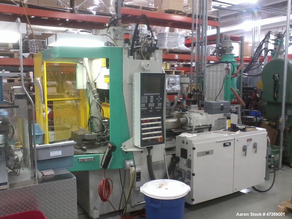 Used Engel Vertical Injection Molding Machine, Model 85 Rotary. 2 Station, 85 ton. Platen size 21.6" x 12.60". Daylight 9.8" min x 21.6" max. CC90 controls, 11.8" clamp stroke, 38" diameter table. 5....