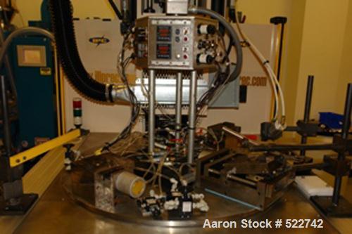 USED: Illinois Precision Corporation (IPC) insert molding machine, model TTM-BCCL. 10 ton, 1 oz barrel; variable shot size; air heat exchanges for oil cooking; Barber-Coleman Maco controls with Optim...