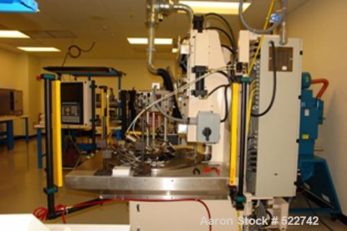 USED: Illinois Precision Corporation (IPC) insert molding machine, model TTM-BCCL. 10 ton, 1 oz barrel; variable shot size; air heat exchanges for oil cooking; Barber-Coleman Maco controls with Optim...