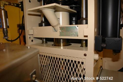 USED: Illinois Precision Corporation (IPC) insert molding machine, model TTM-BCCL. 10 ton, 1 oz barrel; variable shot size; air heat exchanges for oil cooking; Barber-Coleman Maco controls with Optim...
