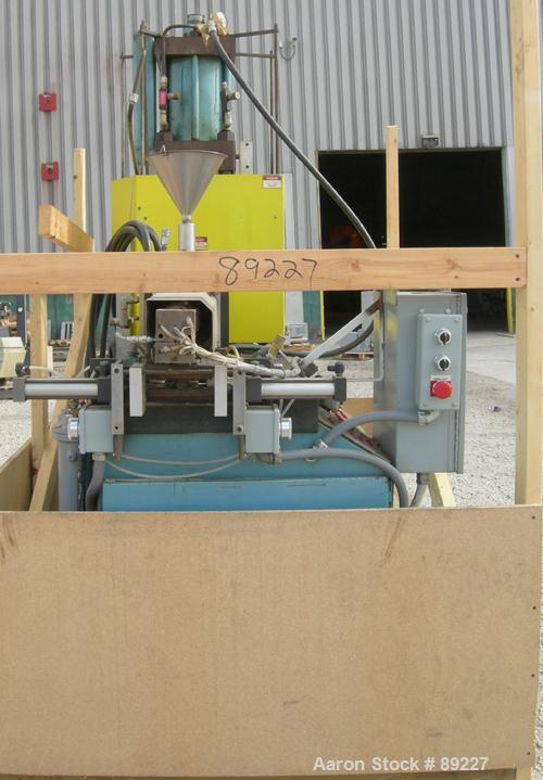 USED: Jaco vertical injection molder, model IV2.5SM. Approximate 2.5 ton capacity. Built 1980.