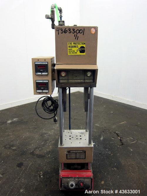 Used Morgan-Press Vertical Injection Molder, Model G100T. 20 Ton maximum clamping force, 0-800 degrees F temperature control range, 12,000 psi maximum injection pressure. 
