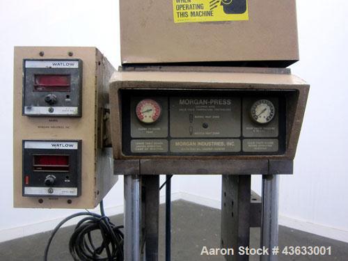 Used Morgan-Press Vertical Injection Molder, Model G100T. 20 Ton maximum clamping force, 0-800 degrees F temperature control range, 12,000 psi maximum injection pressure. 
