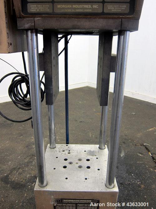 Used Morgan-Press Vertical Injection Molder, Model G100T. 20 Ton maximum clamping force, 0-800 degrees F temperature control range, 12,000 psi maximum injection pressure. 
