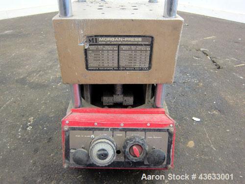 Used Morgan-Press Vertical Injection Molder, Model G100T. 20 Ton maximum clamping force, 0-800 degrees F temperature control range, 12,000 psi maximum injection pressure. 
